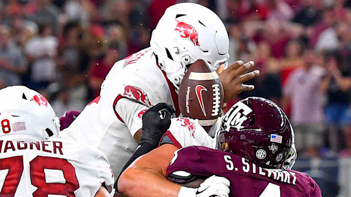 Arkansas quarterback KJ Jefferson fumbles the ball trying to jump over the goal line against Texas A&M in Arlington.